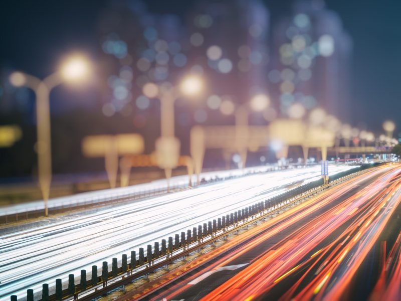 traffic light trails on urban street in city of China.